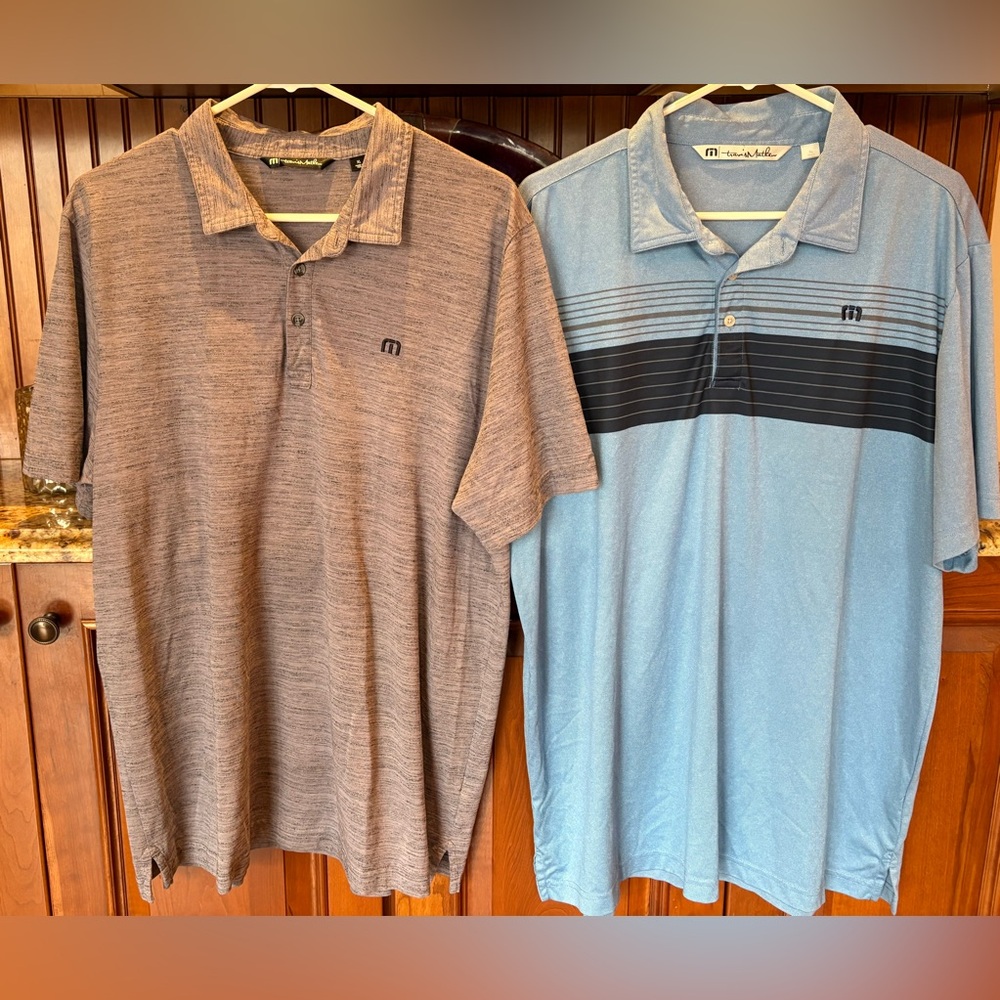Travis Mathew men’s golf polos (2). Sharp heather purple & Blue w/stripes & logo